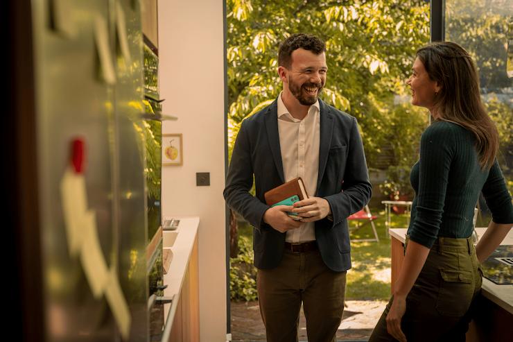 image of an agent visiting a house